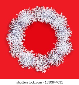 Frame in shape of wreath with snowflakes. Silhouette of round border for xmas invitation card. Vintage Christmas decoration for paper cut out.