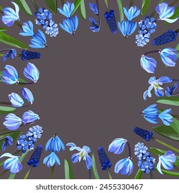 Frame of snowdrops and muscari on a gray background