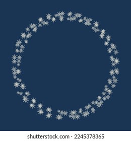 A frame with snowflakes on a dark background . Abstract decorative pattern. The concept of winter holidays. Decoration for banners, advertisements, postcards.
