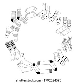 Frame with socks vector black and white sketch of stylish cotton and woolen socks with different textures isolated on white background. Wear background in doodle style drawing. Creative ink art work.