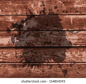 frame with splashes on a brown grunge striped wooden background