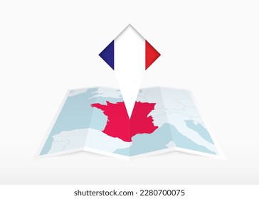 France is depicted on a folded paper map and pinned location marker with flag of France. Folded vector map.