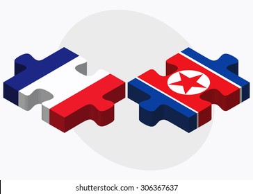 France and Korea-North Flags in puzzle isolated on white background
