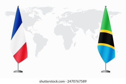 France and Tanzania flags for official meeting against background of world map.