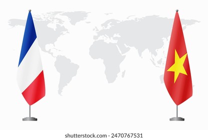 France and Vietnam flags for official meeting against background of world map.