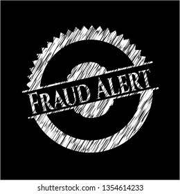 Fraud Alert chalk emblem written on a blackboard