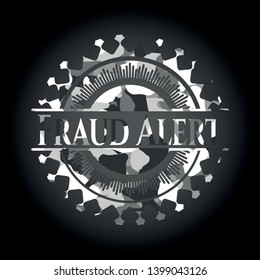 Fraud Alert on grey camouflaged texture