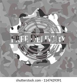 Free Delivery written on a grey camouflage texture