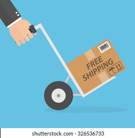 Free shipping concept. Hand pushing hand cart or dolly with a package on it. Free shipping text on the cardboard box. Flat style