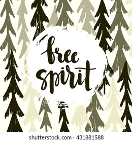 "Free Spirit" hand-written phrase on forest background.Hand drawn lettering. Modern brush calligraphy.