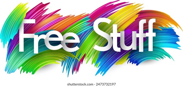 Free stuff paper word sign with colorful spectrum paint brush strokes over white. Vector illustration.