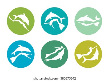 Freediving color icons - friendship between people and dolphin. Vector collection of silhouette freedivers and dolphins.