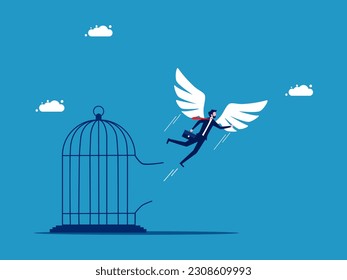 Freedom. Businessman with wings flying out of the cage