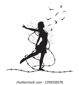 Freedom concept.Girl silhouette with barbed wire and birds. Release from barbed wire