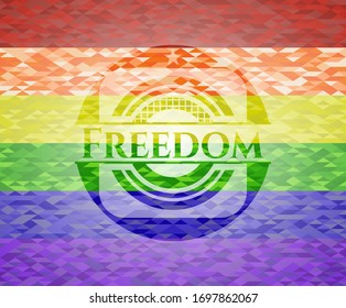 Freedom emblem on mosaic background with the colors of the LGBT flag