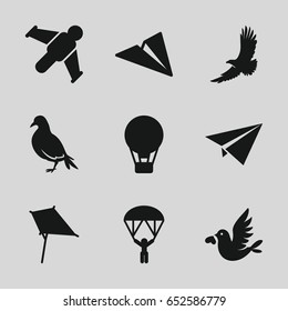 Freedom icons set. set of 9 freedom filled icons such as dove, eagle, kite, love bird, man with parachute, paper plane, hang glider