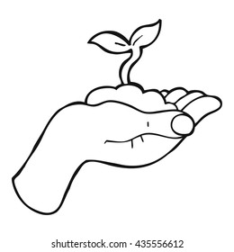 freehand drawn black and white cartoon seedling growing held in hand