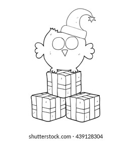 freehand drawn black and white cartoon little owl wearing christmas hat