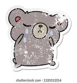 freehand drawn distressed sticker cartoon of a cute crying bear