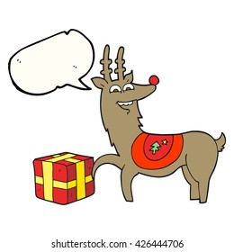 freehand drawn speech bubble cartoon christmas reindeer with present