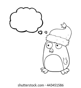 Cartoon-Pinguin mit freehand gezeichneter Gedankenblase auf Weihnachtsmütze