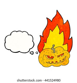 freehand drawn thought bubble textured cartoon flaming halloween pumpkin