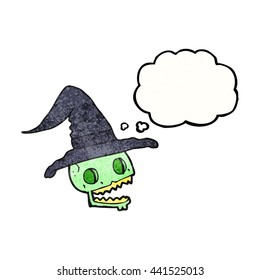 freehand drawn thought bubble textured cartoon skulll wearing witch hat