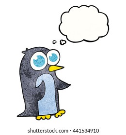 freehand drawn thought bubble textured cartoon penguin with big eyes