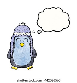 freehand drawn thought bubble textured cartoon penguin wearing hat