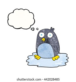 freehand drawn thought bubble textured cartoon penguin on ice