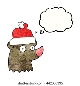 freehand drawn thought bubble textured cartoon bear wearing christmas hat