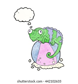 freehand drawn thought bubble textured cartoon chameleon on ball