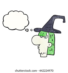 freehand drawn thought bubble textured cartoon witch head