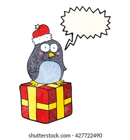 freehand speech bubble textured cartoon christmas penguin