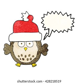freehand speech bubble textured cartoon owl wearing christmas hat