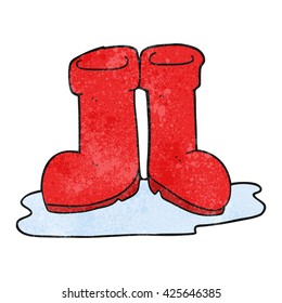 freehand textured cartoon wellington boots in puddle