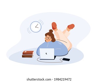 Freelance concept. Girl working on the computer lying on the floor