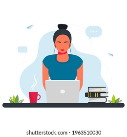 Freelance, online studying, work from home concept. girl sitting with laptop. The girl sits at the table and works on a laptop with a home plant in the background. freelance concept