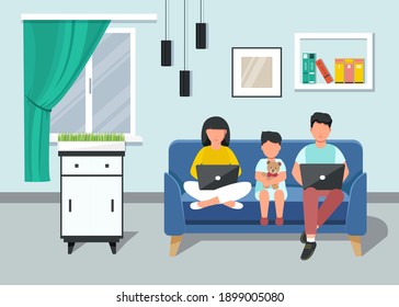 Freelancer. Family with small child working from home on a laptop sitting on the couch. Home Office