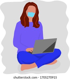 Freelancer girl working on a laptop while sitting on the floor in a medical mask in quarantine