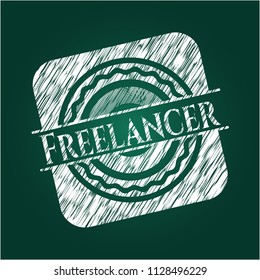 Freelancer on green chalkboard