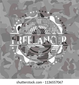 Freelancer on grey camouflage texture