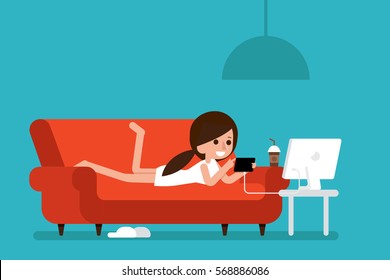 Freelancer working at home with taplet on cozy sofa.