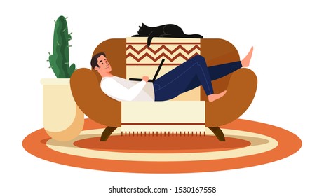 Freelancer working on sofa at home. Male holding a laptop. Concept of freelance lifestyle.