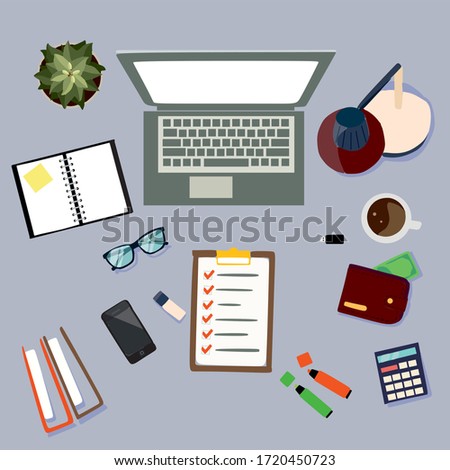 Freelancer's desktop, top view. The concept of working at home. Computer Desk with everything you need to work