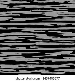 Frehand gray ink stripe backdrop. Artistic brush stripes seamless pattern on black background. Vector illustration