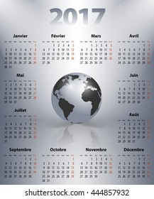 French business calendar for 2017 year with the world globe in a spot lights. Best calendar for print, business and web design use. Poster format calendar. Mondays first. Vector illustration