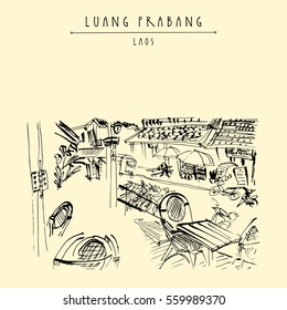 French cafe in a backpacker district of Luang Prabang, Laos, Southeast Asia.  Vintage hand drawn touristic postcard in vector.