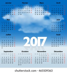 French Calendar for 2017 year with clouds in the blue sky. Mondays first. For web, print and presentations. Vector illustration