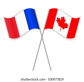 French and Canadian crossed flags. France combined with Canada isolated on white. Language learning, international business or travel concept.